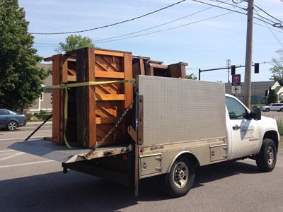 A truck load of flood damaged pianos heading to the transfer station