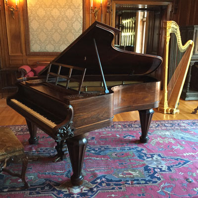 1860s Chickering Cocked Hat grand piano on a movie set